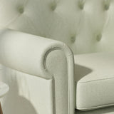 Sofa upholstered in a light blue Scandi-style semi-plain upholstery fabric with a stain resistant finish
