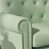 Sofa upholstered in a green Scandi-style semi-plain upholstery fabric with a stain resistant finish
