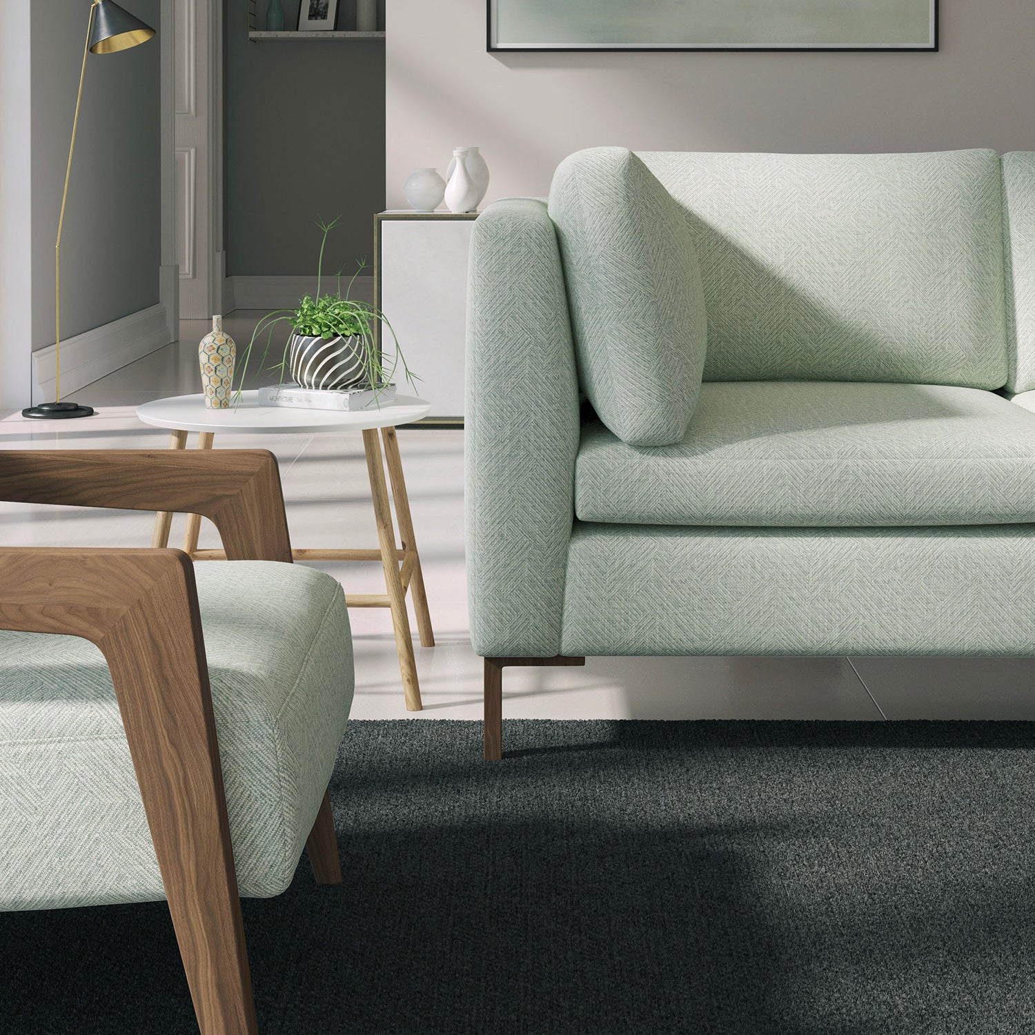 Living room with a contemporary sofa upholstered in a light blue semi-plain Scandi-style upholstery fabric