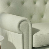 Sofa upholstered in a green Scandi-style semi-plain upholstery fabric with a stain resistant finish
