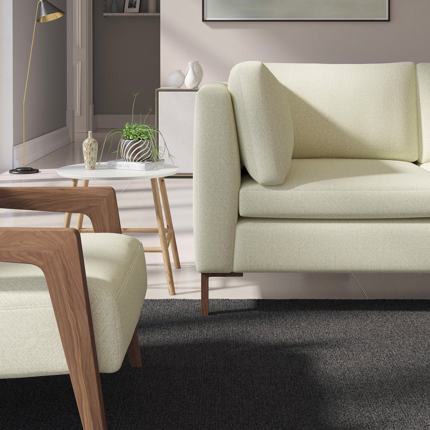 Living room with a contemporary sofa upholstered in a neutral semi-plain Scandi-style upholstery fabric