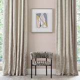Curtain in luxury silk and cotton neutral coloured fabric with swirl design