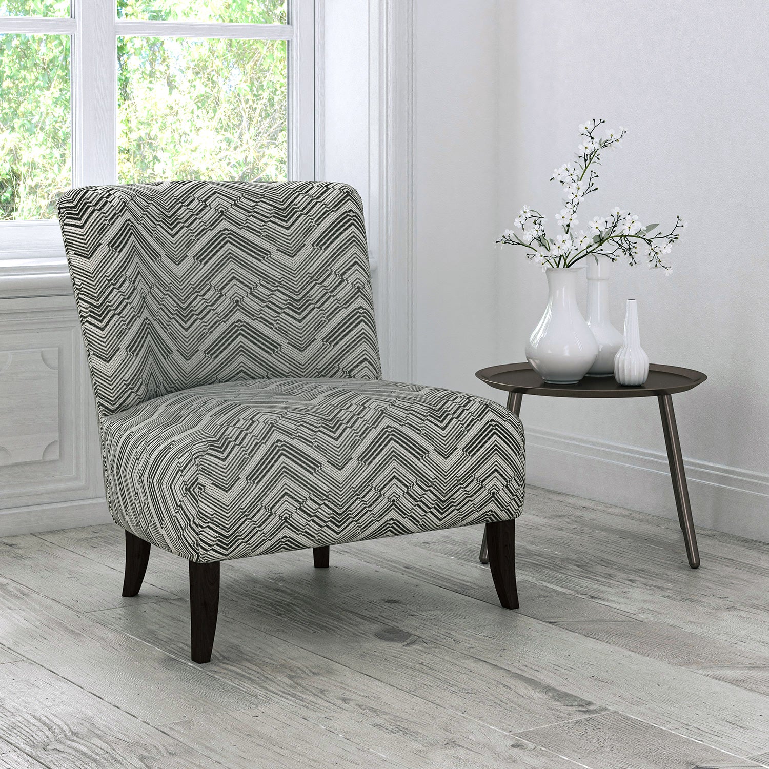 Chair upholstered in a stain resistant dark neutral herringbone weave upholstery fabric