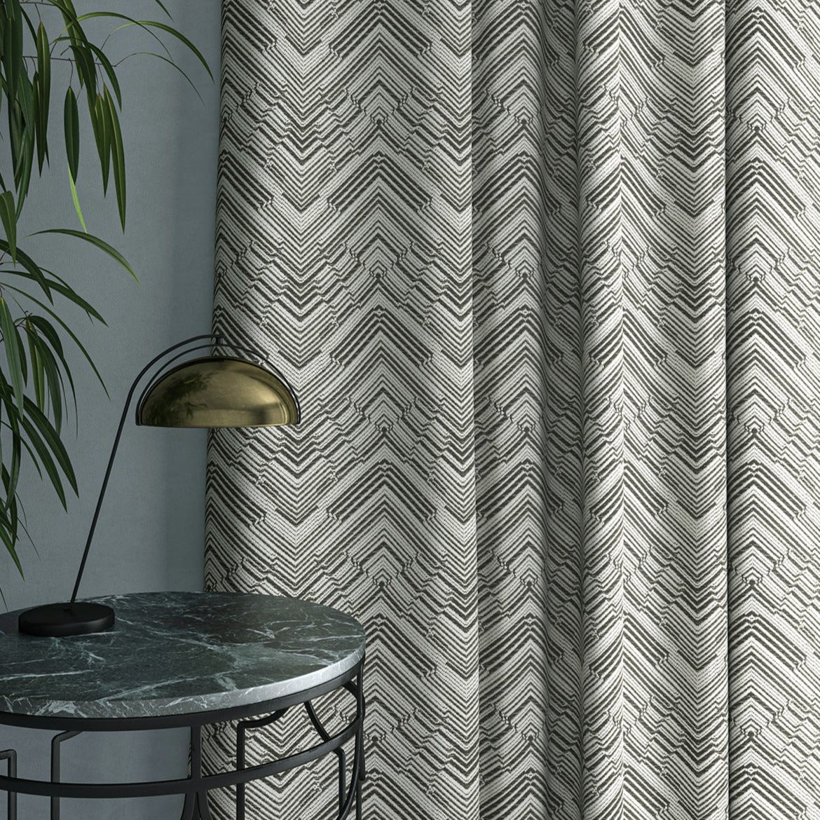 Curtain in a stain resistant dark neutral herringbone weave fabric