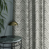 Curtain in a stain resistant dark neutral herringbone weave fabric