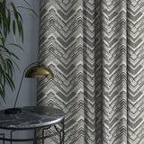 Curtain in a stain resistant grey herringbone weave fabric