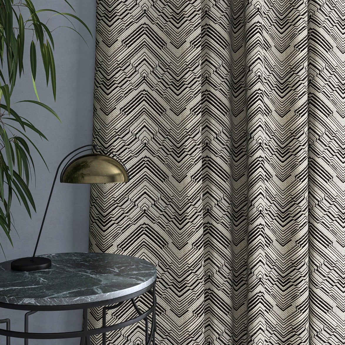 Curtain in a stain resistant dark grey herringbone weave fabric