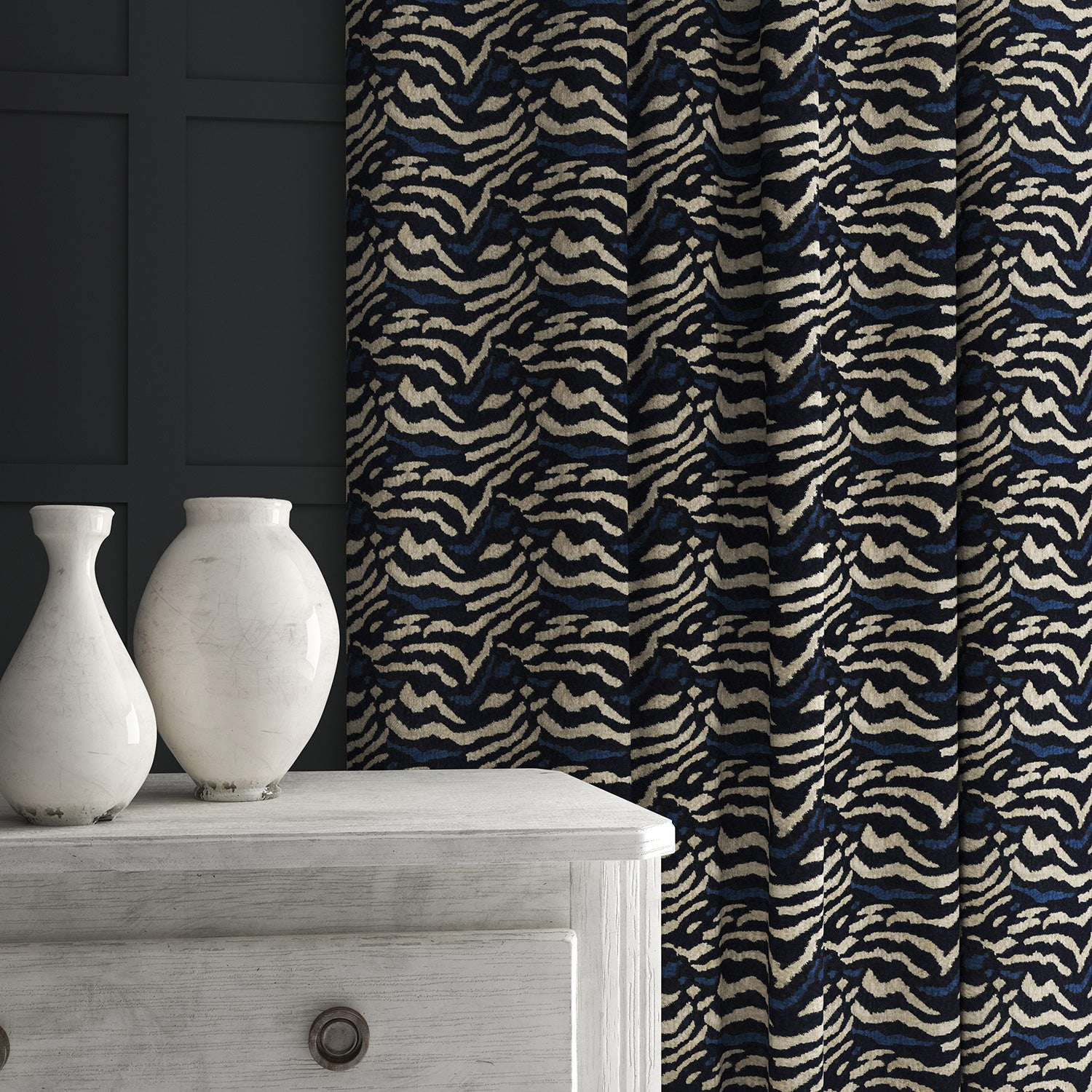 Velvet curtain in a dark blue velvet with abstract animal print design