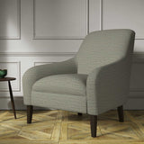 Chair covered in a woven fabric in a herringbone design in Greystone