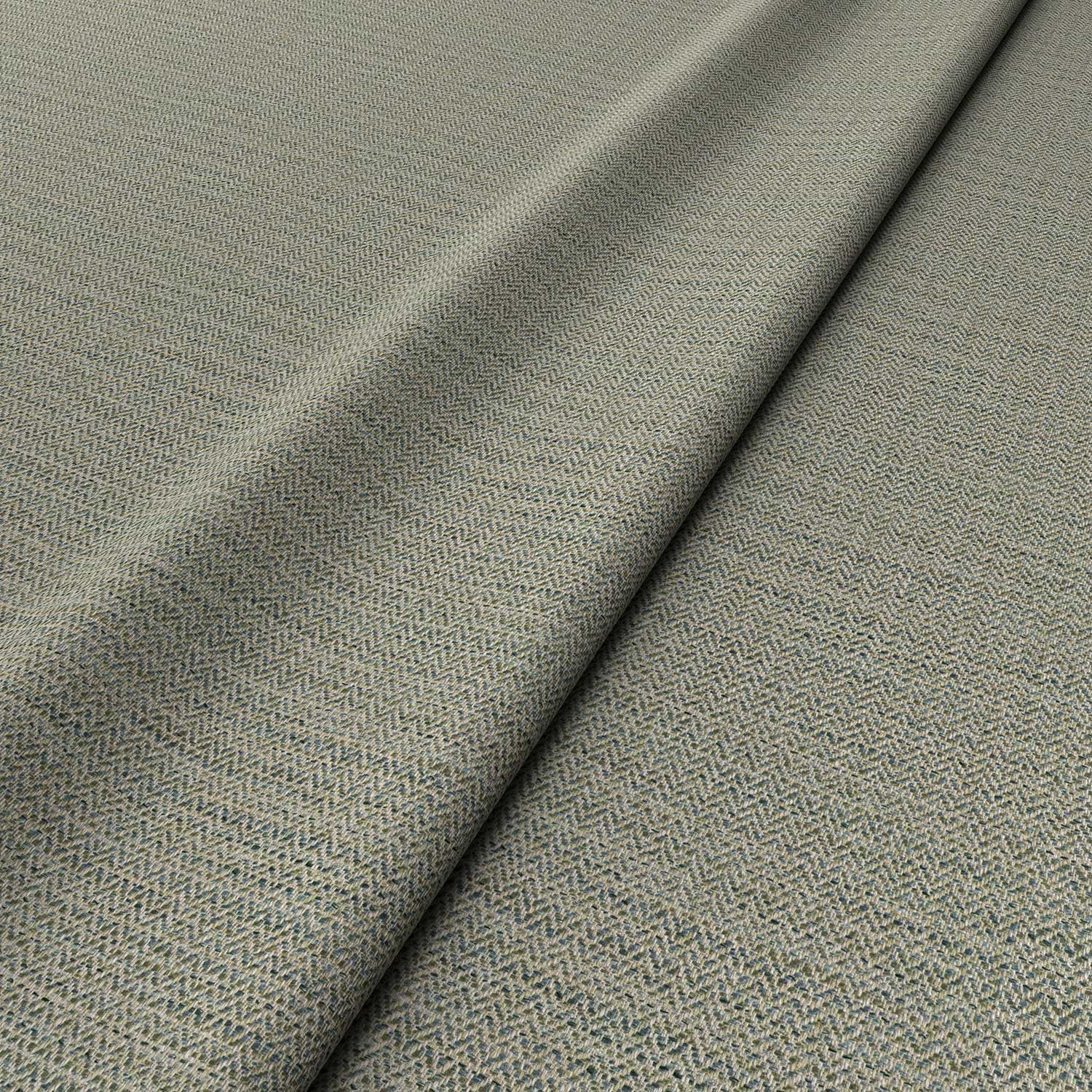 Sample of a woven fabric in a herringbone design in greystone