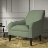 Chair covered in a woven fabric in a herringbone design in Seagrass