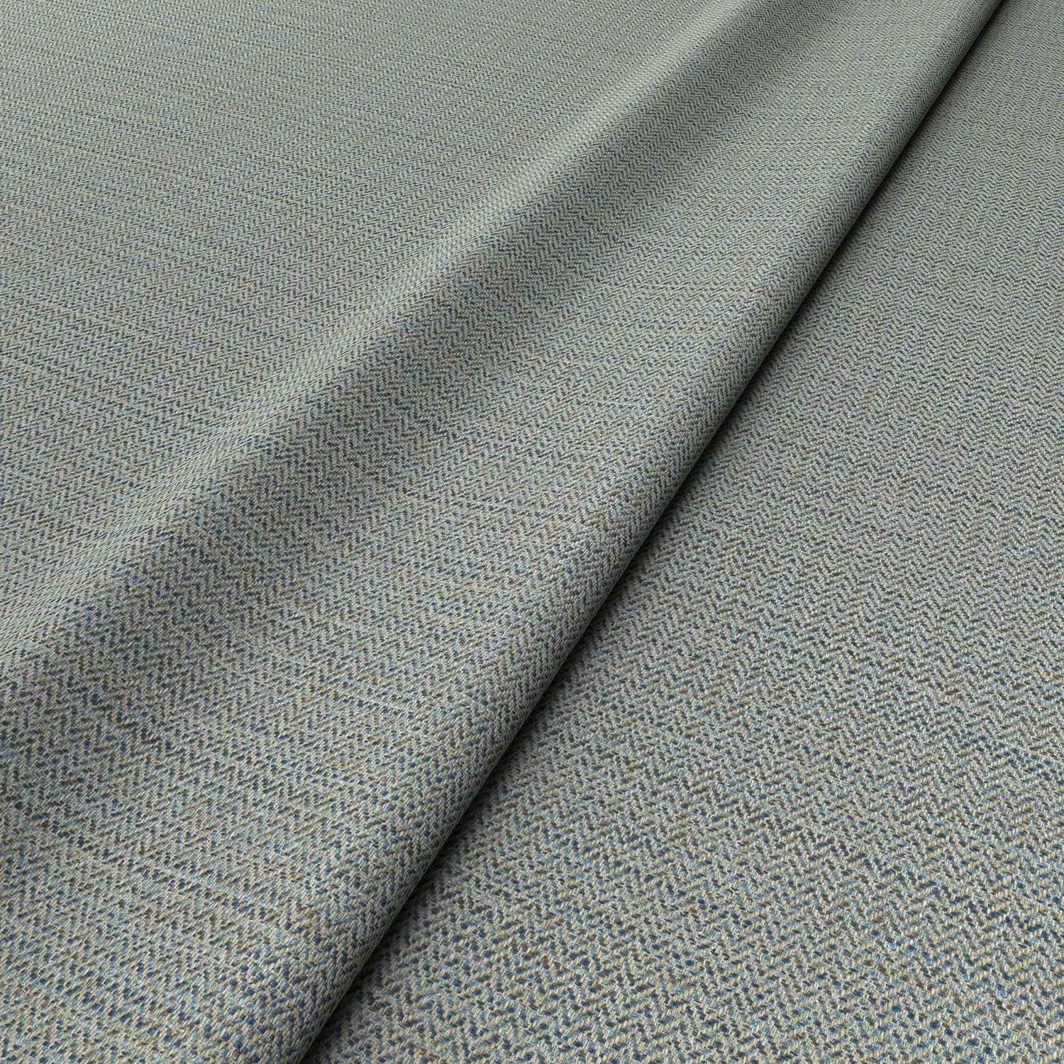 Sample of a woven fabric in a herringbone design in Denim