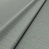 Sample of a woven fabric in a herringbone design in Denim