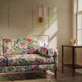 Sofa upholstered in a lively, large scale floral linen fabric