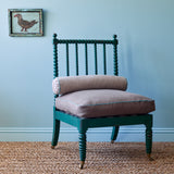 A brown woven fabric on a chair.