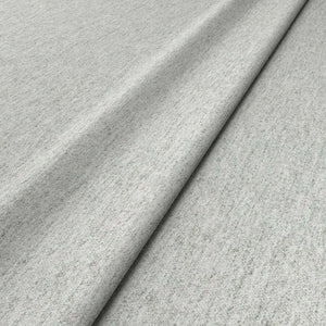 Sample of a white woven fabric in recycled wool.
