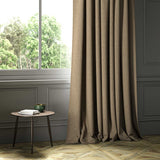 A brown woven fabric shown as a curtain.