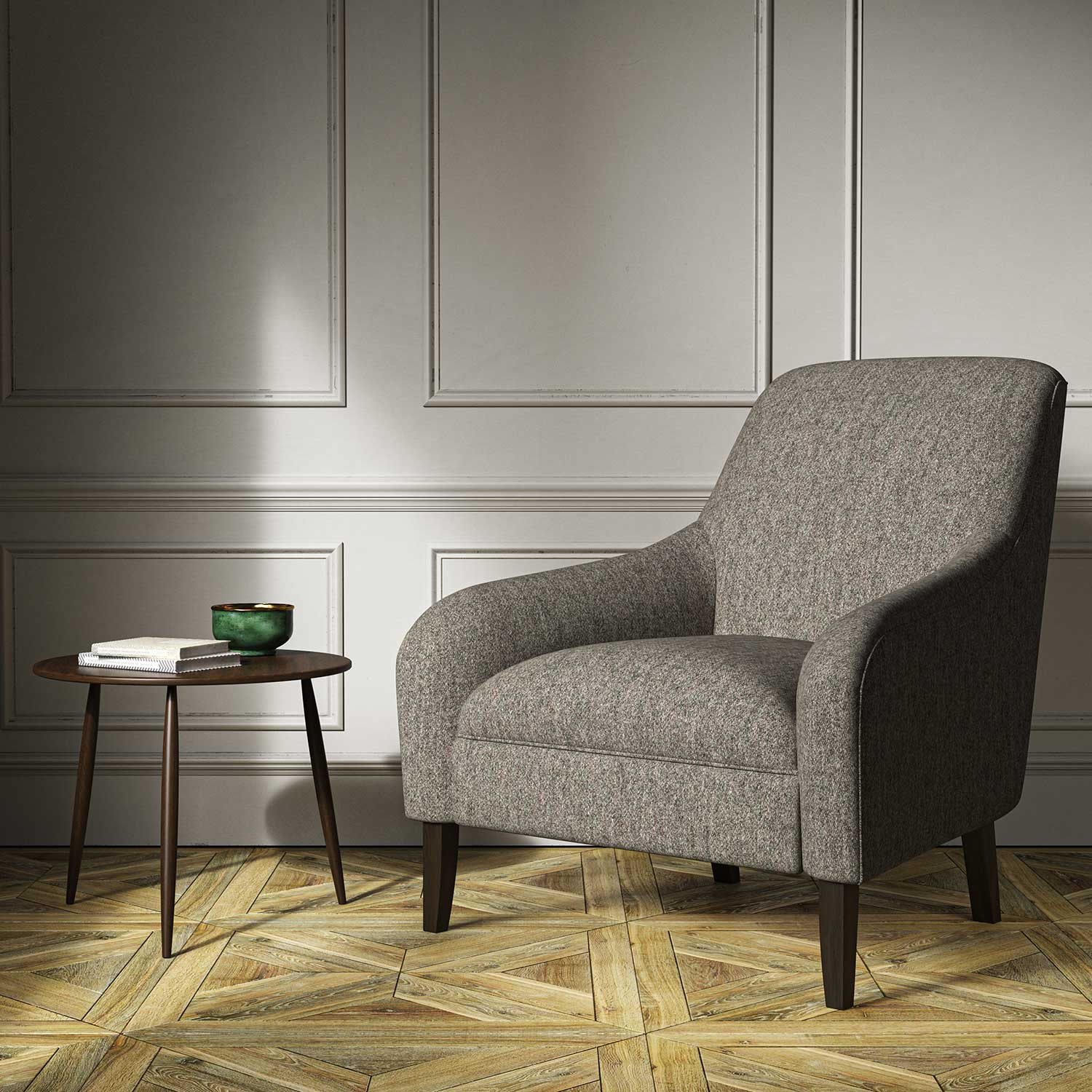 A grey woven fabric on an armchair.