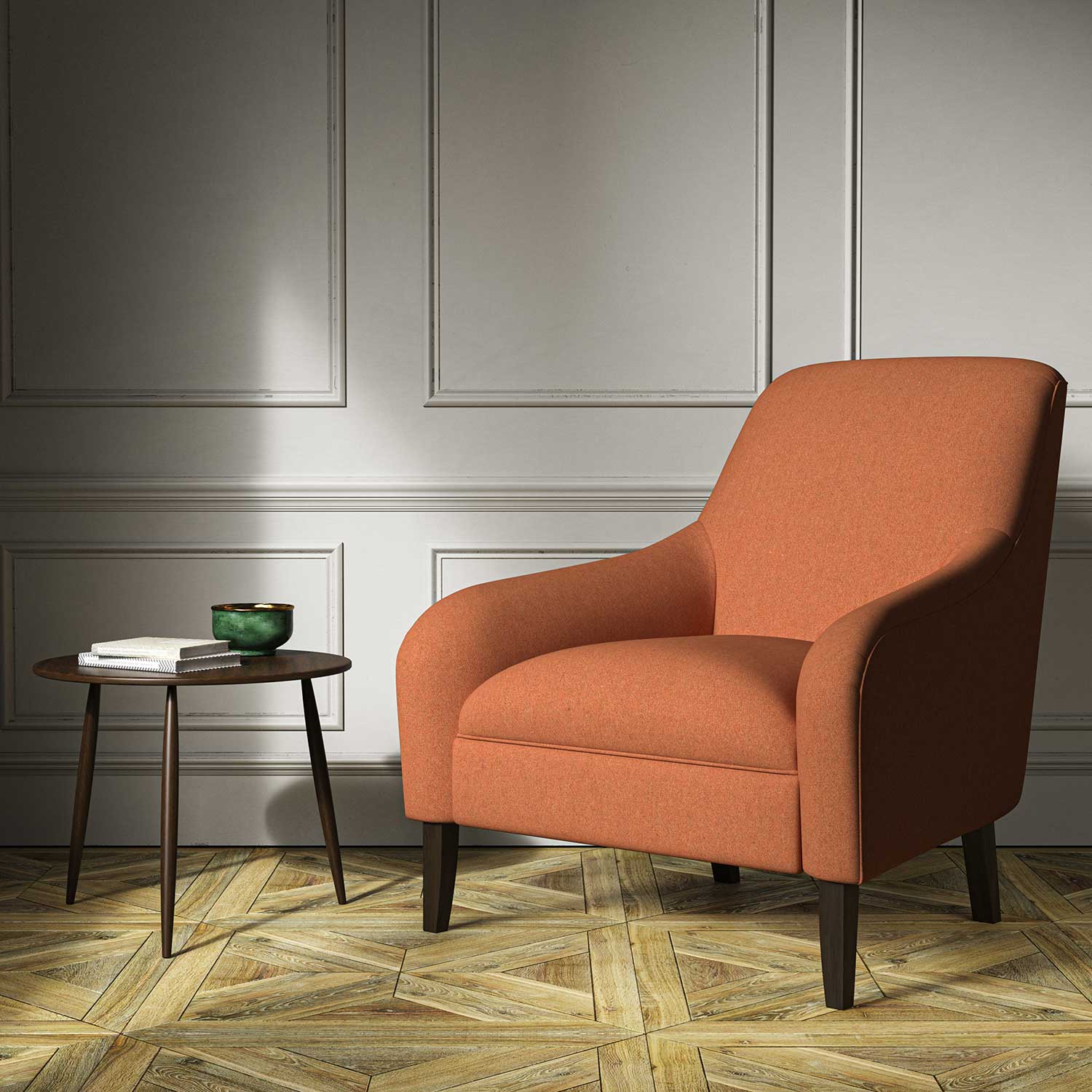A orange woven fabric on an armchair.