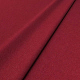 Sample of a red woven fabric in recycled wool.