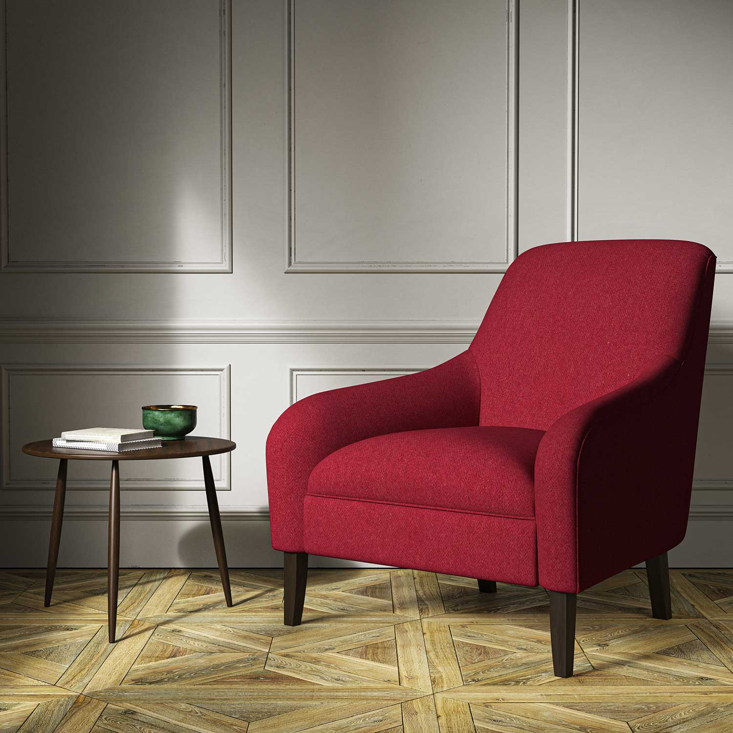 A red woven fabric on an armchair.