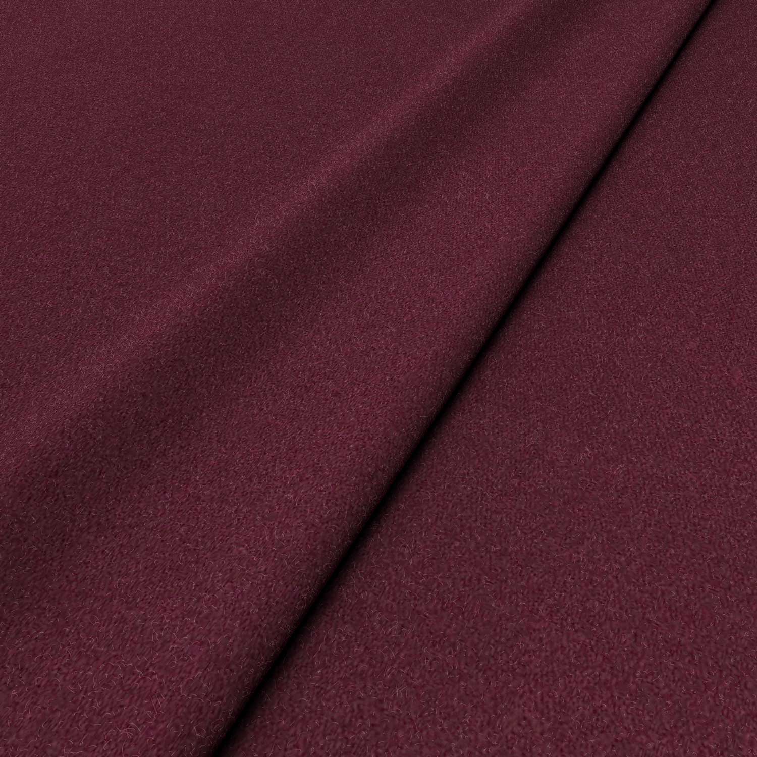 Sample of a red woven fabric in recycled wool.