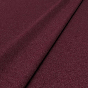 Sample of a red woven fabric in recycled wool.