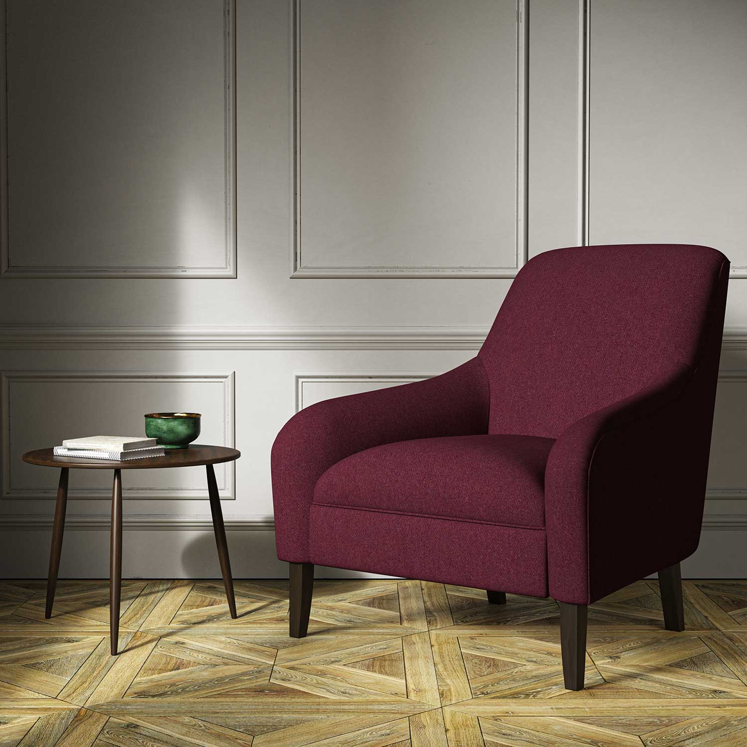A red woven fabric on an armchair.