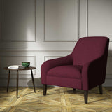 A red woven fabric on an armchair.