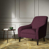 A purple woven fabric on an armchair.