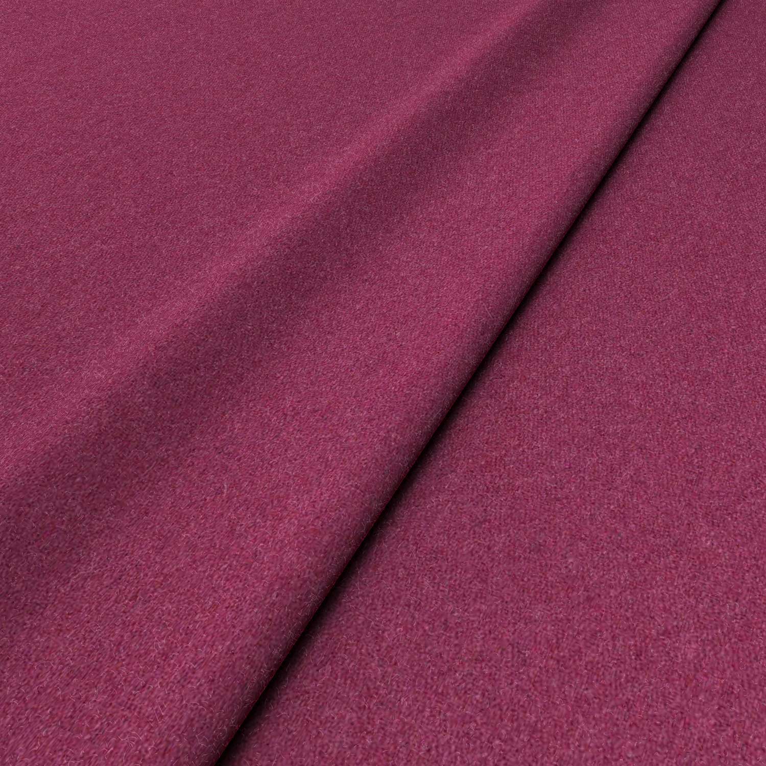 Sample of a pink woven fabric in recycled wool.