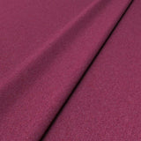 Sample of a pink woven fabric in recycled wool.