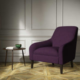 A purple woven fabric on an armchair.