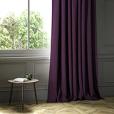 A purple woven fabric shown as a curtain.