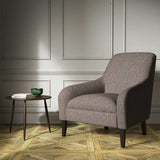 A brown woven fabric on an armchair.