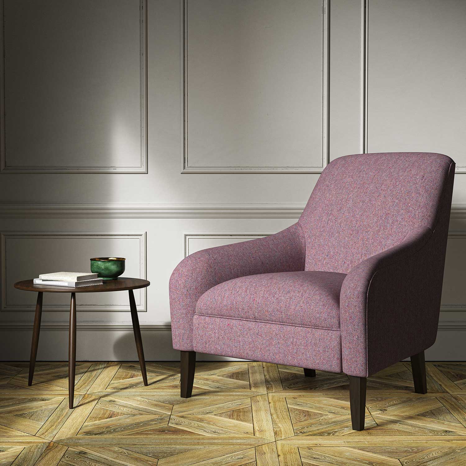 A purple woven fabric on an armchair.