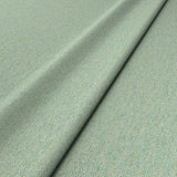 Sample of a green woven fabric in recycled wool.