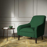 A green woven fabric on an armchair