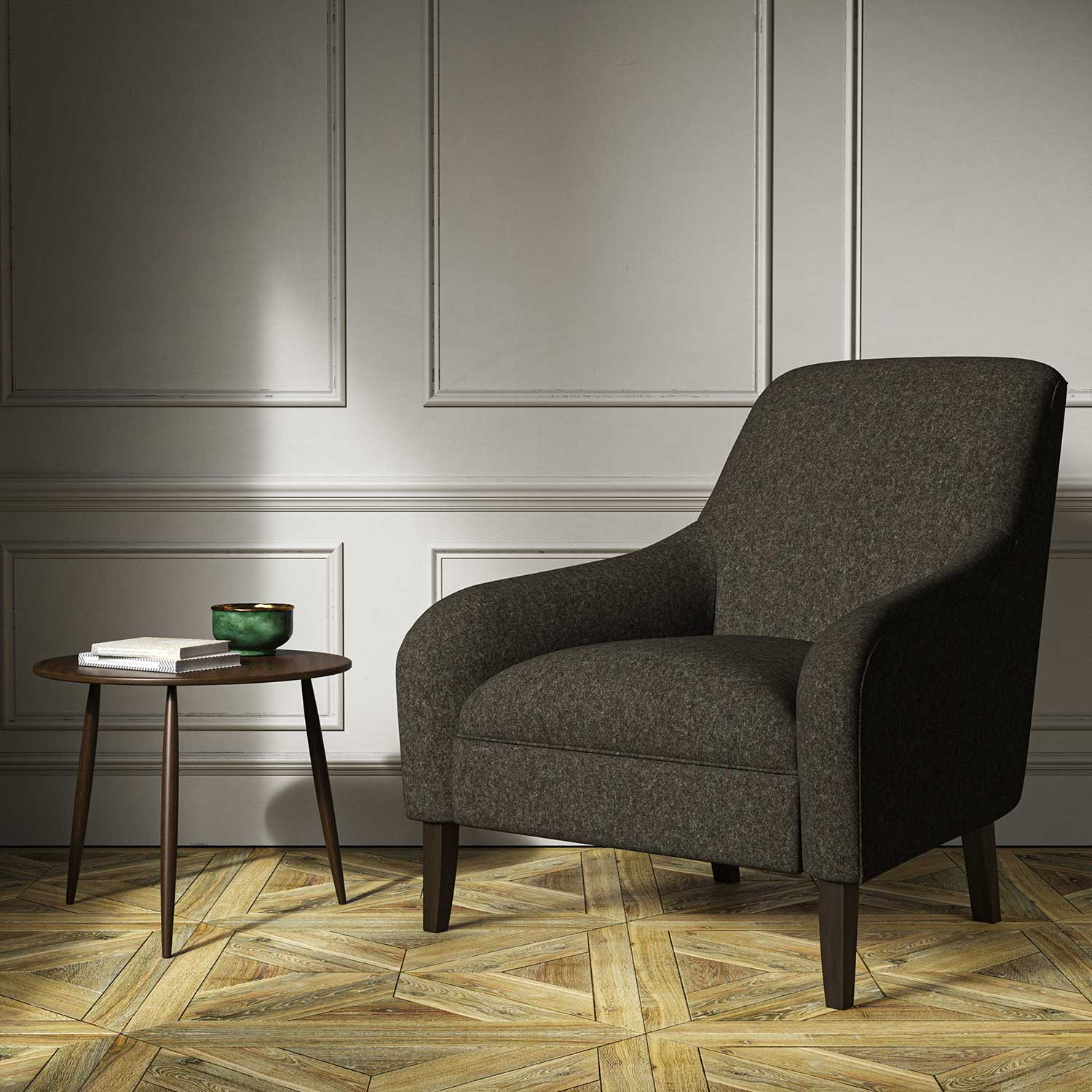 A grey woven fabric on an armchair.