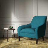 A blue woven fabric on an armchair.