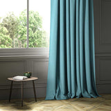 A blue woven fabric shown as a curtain.