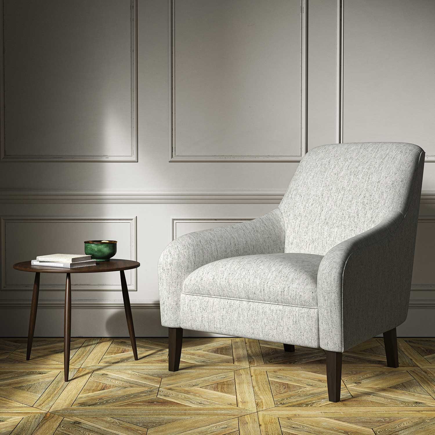 A grey woven fabric on an armchair.