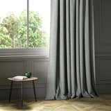 A grey woven fabric shown as a curtain.