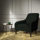 A black woven fabric on an armchair.