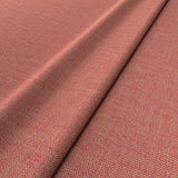 Fabric swatch of a plain red weave fabric for upholstery