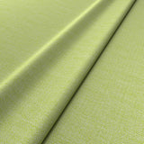 Fabric swatch of a plain green weave fabric for upholstery
