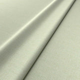 Fabric swatch of a cream woven fabric for upholstery