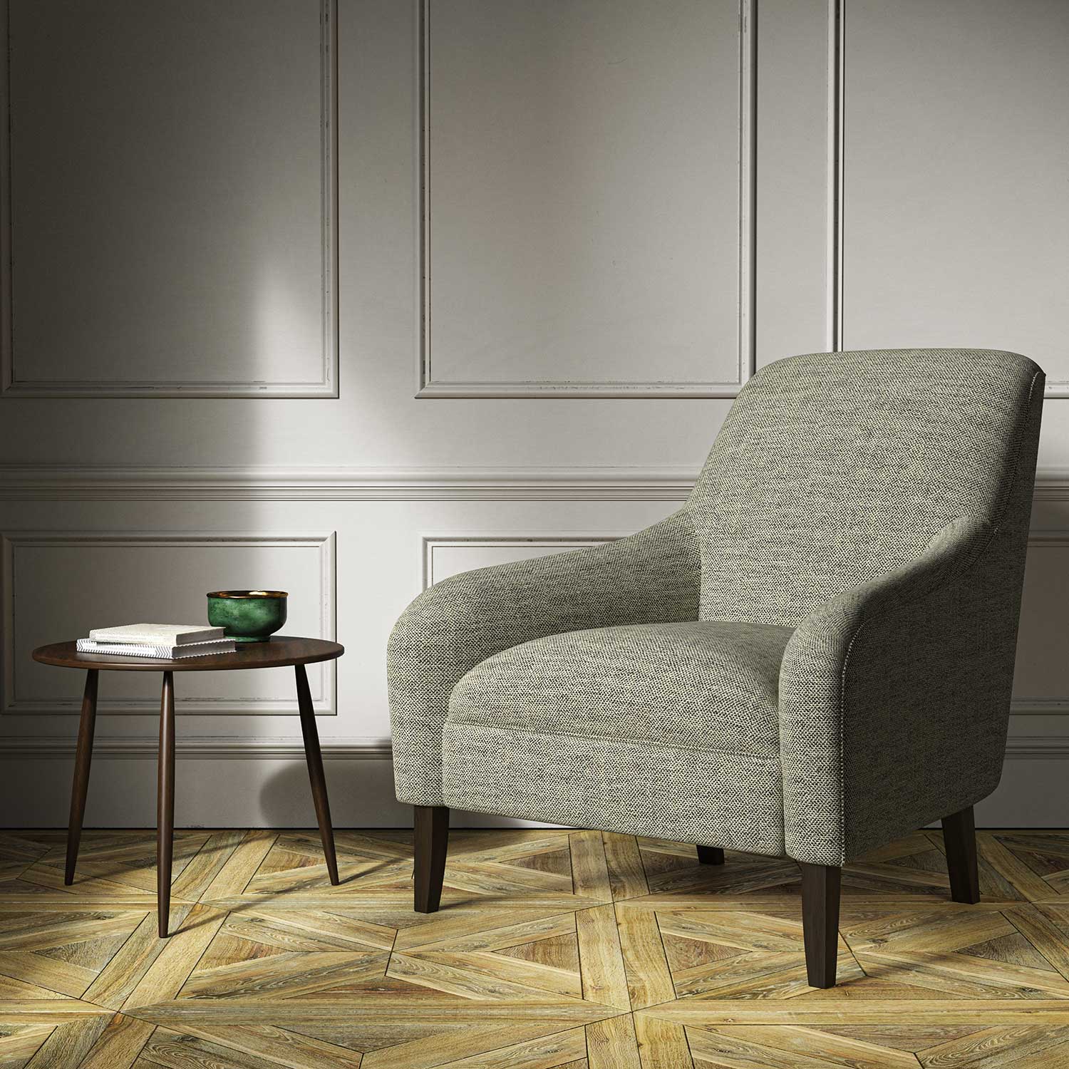 Armchair upholstered in a grey woven fabric