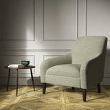 Chair upholstered in a plain dark grey weave fabric