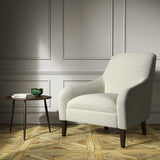 Armchair upholstered in a grey woven fabirc